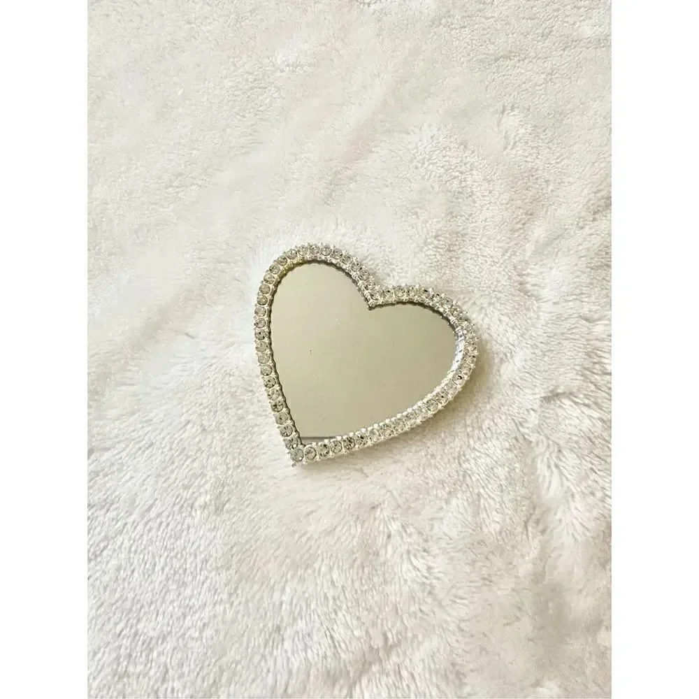 Silver with rhinestone embellished heart shaped phone mirror